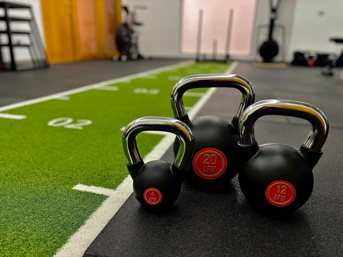 Kettlebells sobre el carril de arrastre